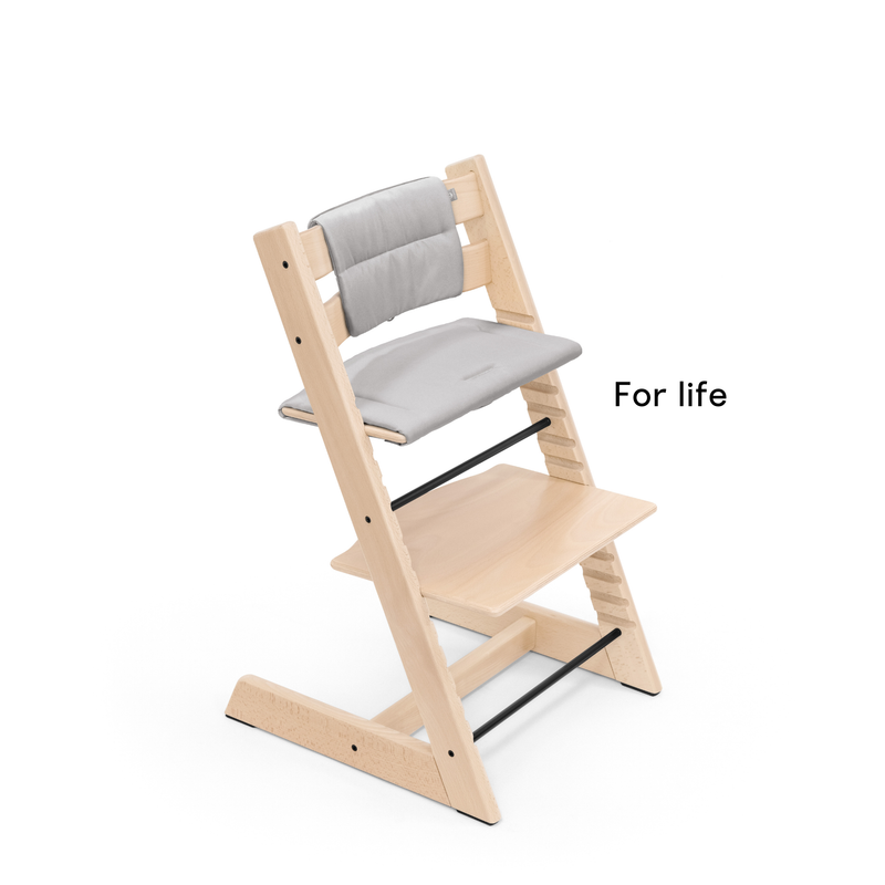 Natural Tripp Trapp chair wit, an Anthracite Tripp Trapp cushion